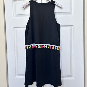 Black Shift Dress with Colorful Tassel accents and one snap shoulder.  Sz: XL